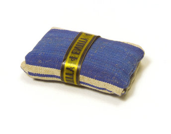 Packet of demined soil.