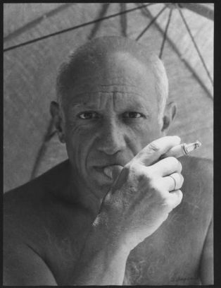 Pablo Picasso shirtless.