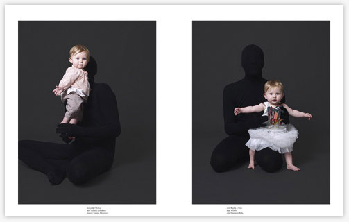 Two baby girls model kids clothing with hidden figure in background. Blommers and Schumm.