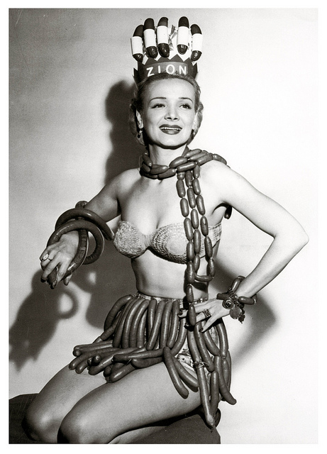 Geene Courtney, Sausage Queen. Sponsored by the Zion Meat Company during National Hot Dog Week, 1955.